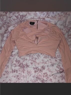 BEBE Pink long sleeve Criss cross crop top